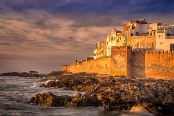 Essaouira Ramparts: Ancient walls overlooking the crashing waves and rocky shoreline