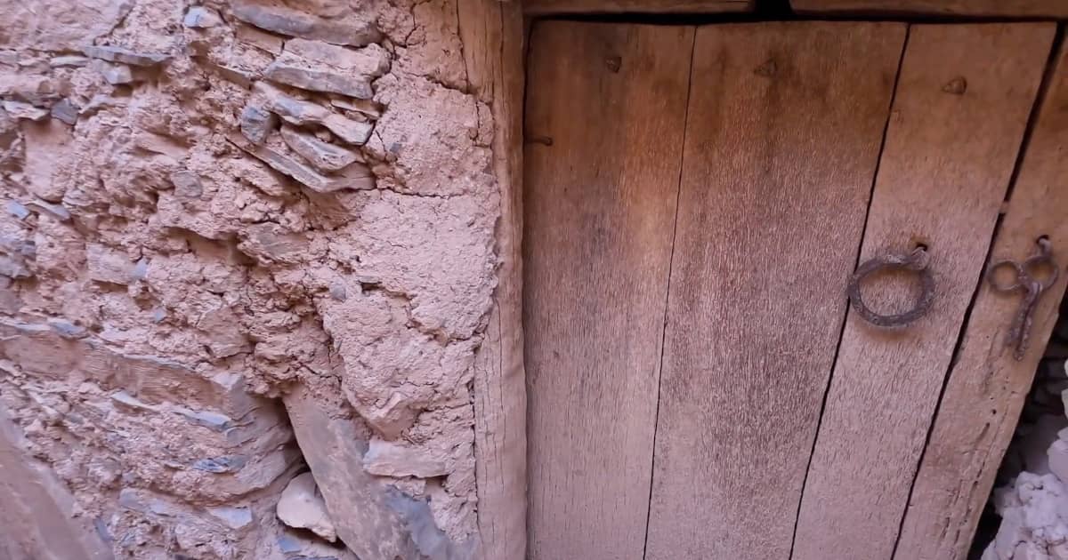 Close-up of stone and mud construction of an agadir in Amtoudi, Morocco.