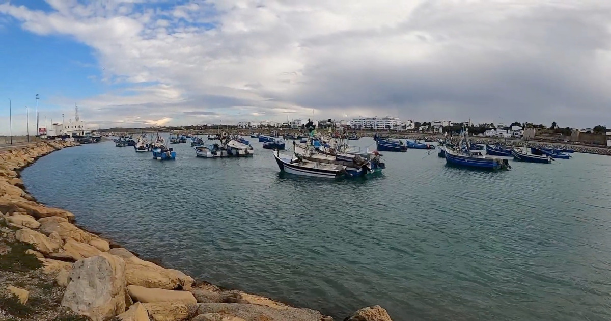 Charming fishing boats docked at Asilah's port, reflecting the town’s maritime heritage.