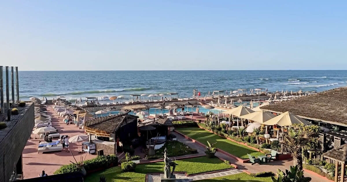 Coastal Vibes on Casablanca’s Corniche Sunlit stroll along Casablanca’s Corniche by the Atlantic.