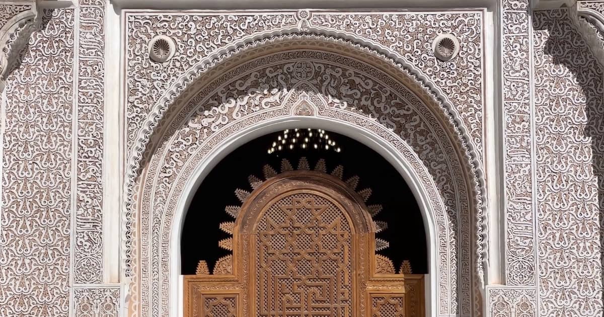 Intricate tile and stucco details at Ben Youssef Madrasa, Marrakesh – Photographer’s Journey in Morocco