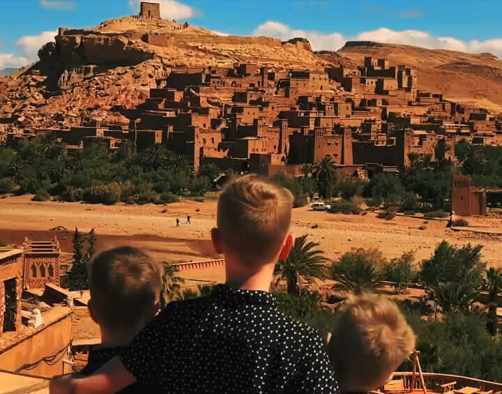 Family exploring Aït Benhaddou during the 11-day Morocco family tour – Marrakesh, Atlas & Desert