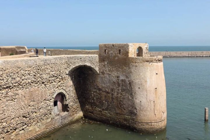 Alt-text: Portuguese fortress walls in El Jadida, Morocco – UNESCO World Heritage tourist attraction