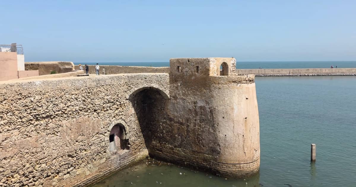 Alt-text: Portuguese fortress walls in El Jadida, Morocco – UNESCO World Heritage tourist attraction
Title: Portuguese Fortress Walls in El Jadida – UNESCO Heritage Morocco
Caption: